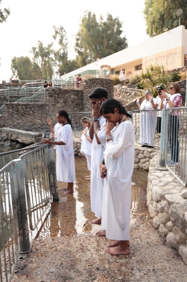 Ron Smith and his wife being baptized in the Jordan River in Israel